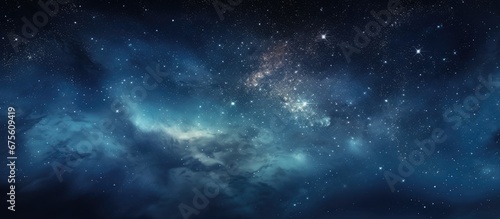 In the abstract background of the night sky the interplay of nature s light reveals a mesmerizing tapestry of space where billowing clouds dance with stars against a canvas of black and blu