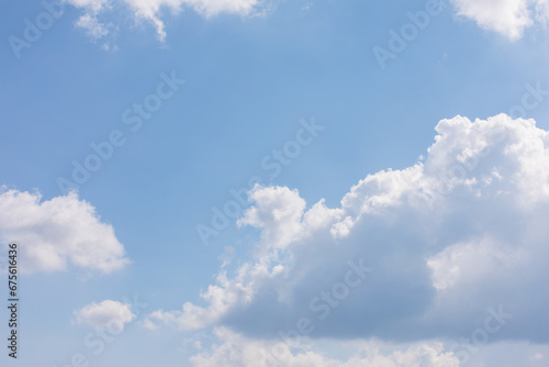 Fototapeta Naklejka Na Ścianę i Meble -  White bird clouds under the blue sky. sunny weather