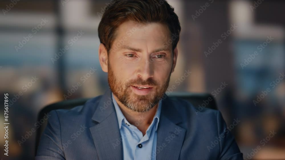 Closeup happy businessman drinking tea working at office late night. Boss work Closeup happy businessman drinking tea working at office late night. Boss work