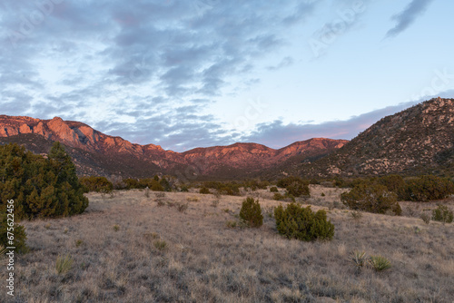 Sandia Mountains turning pink at sunset, as seen from the foothills of Albuquerque, New Mexico.