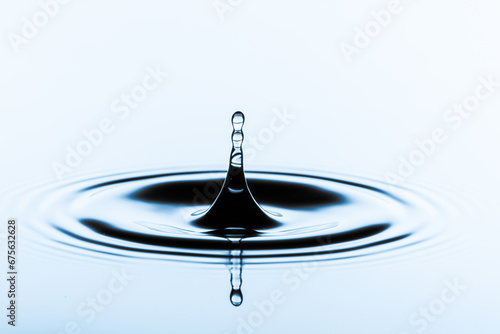 Liquid Alchemy: A magical transformation as a droplet merges with the