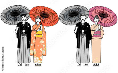 お正月の初詣や観光で和傘をさす着物姿の家族