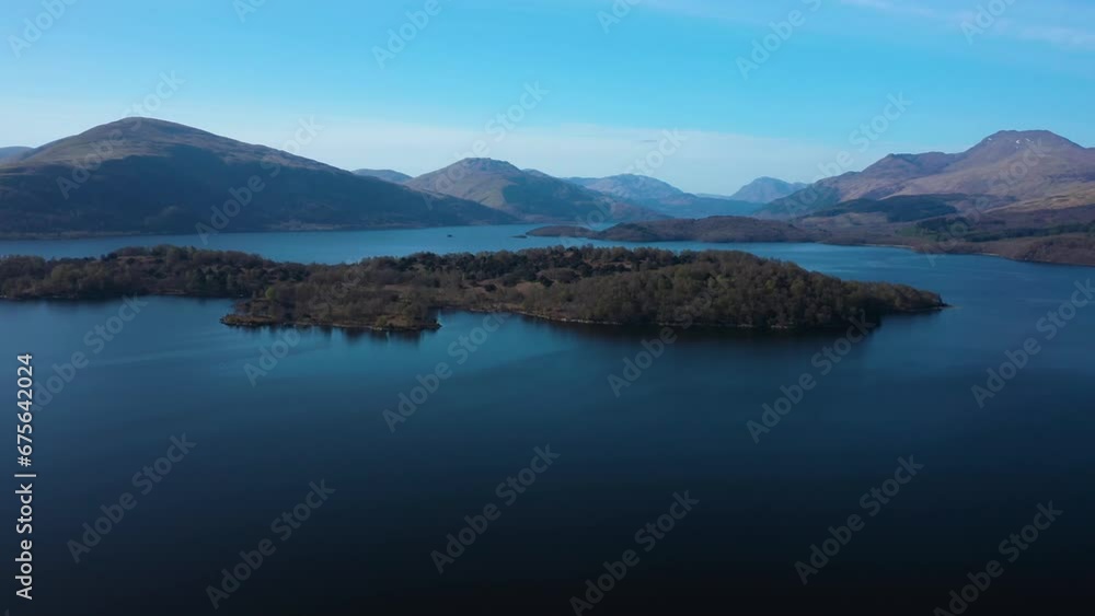 Loch Lomond, Scotland. Aerial View Panning To Islands And Ben Lomond Mountain. United Kingdom. Loch Lomond, Scotland. Aerial View Panning To Islands And Ben Lomond Mountain. United Kingdom.