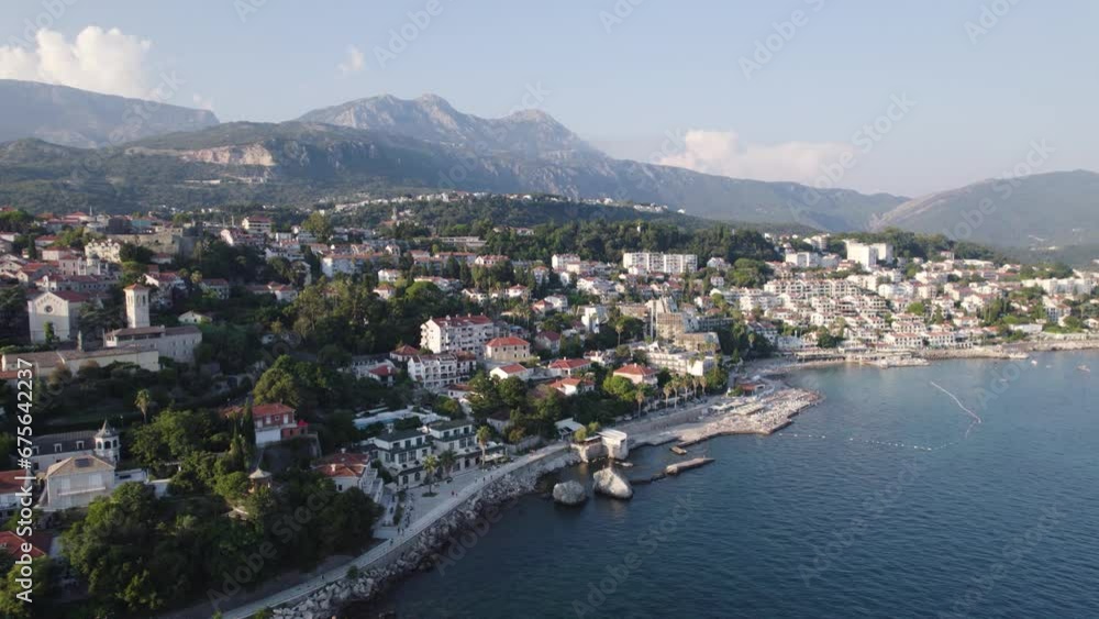 Herceg Novi scenic coastal town aerial view circling bay of Kotor at the foot of mount Orjen, Montenegro mountain range