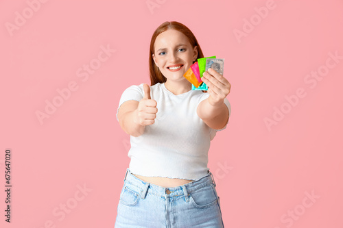 Young woman with condoms sh...