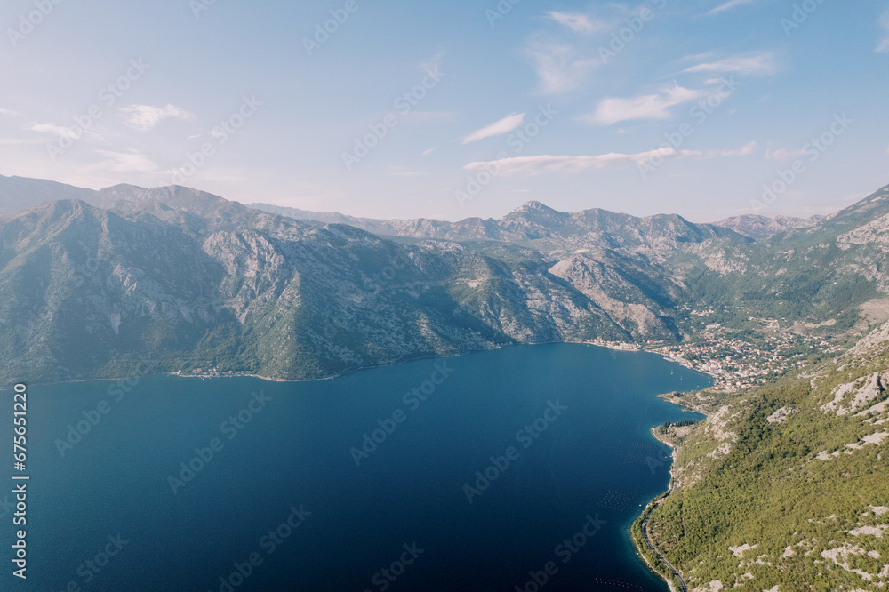 Bay of Kotor is surrounded by a green mountain range. Montenegro. Drone