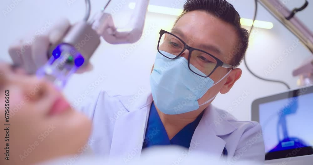 Doctor doing laser on the woman face at beauty clinic. Beautiful woman having facial skin care treatment at beauty clinic. Doctor doing laser on the woman face at beauty clinic. Beautiful woman having facial skin care treatment at beauty clinic.