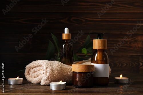 Set of spa supplies on wooden background