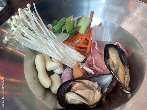 ingredient for cooking Korean stew with vegetable, seafood, Tokpokki, pork, mushrooms, garlic leaves,  Hot pot tteok pok ki has vegetables, meat and red sauce, Korea Hotpot, shabu, food ingredients, photo