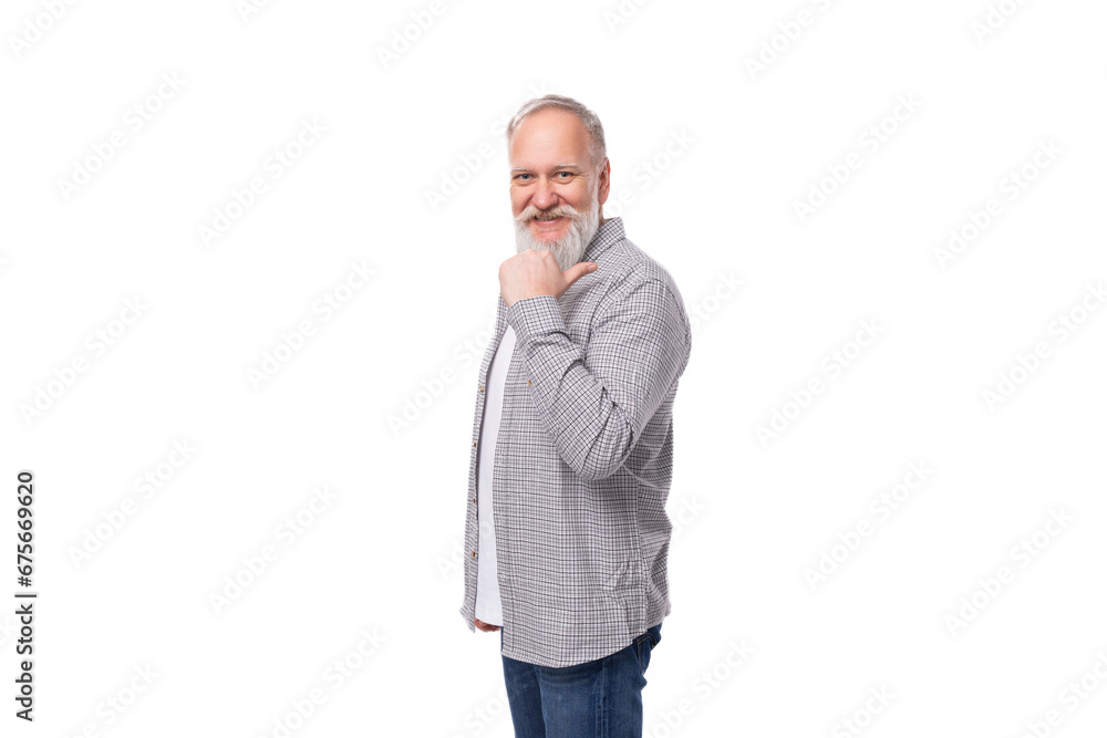 Fototapeta premium handsome gray-haired elderly man with a beard in a checkered shirt on a white background with copy space