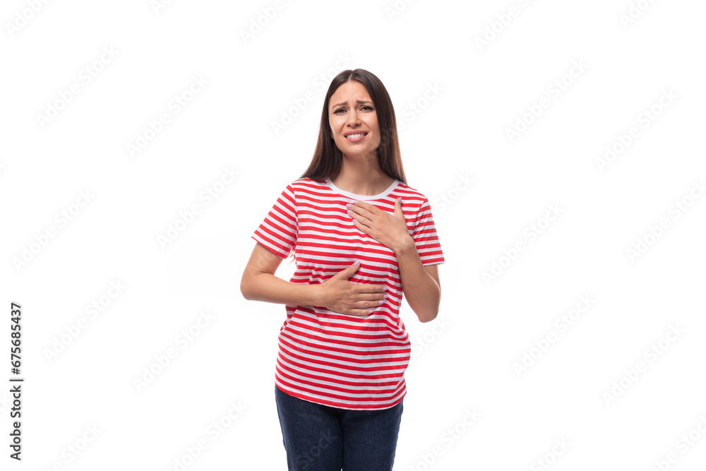 young european woman with straight black hair wears a striped red t-shirt on a white background young european woman with straight black hair wears a striped red t-shirt on a white background