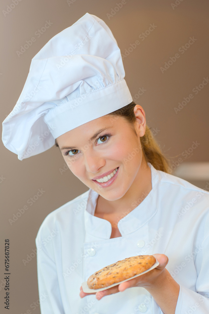 Confectioner proud of her cookie Confectioner proud of her cookie