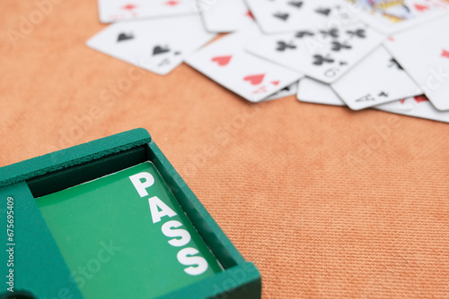 Playing cards and boxes for playing bridge. Gambling, bridge, poker concept. Sport equipment.