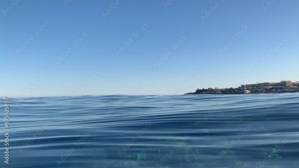 Glassy Water Surface in a Tropical Sea Glassy Water Surface in a Tropical Sea