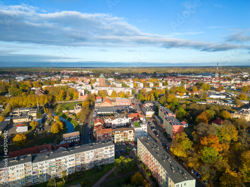 aerial view of the town full of green on a sunny day