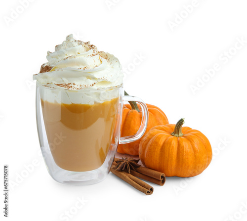 Cup of pumpkin spice latte with whipped cream, squashes and cinnamon sticks isolated on white