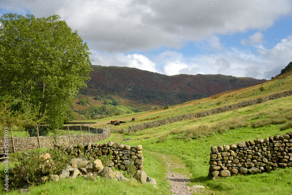 Dry stone wall across footpath in the Great Langdale Valley in the Lake District
