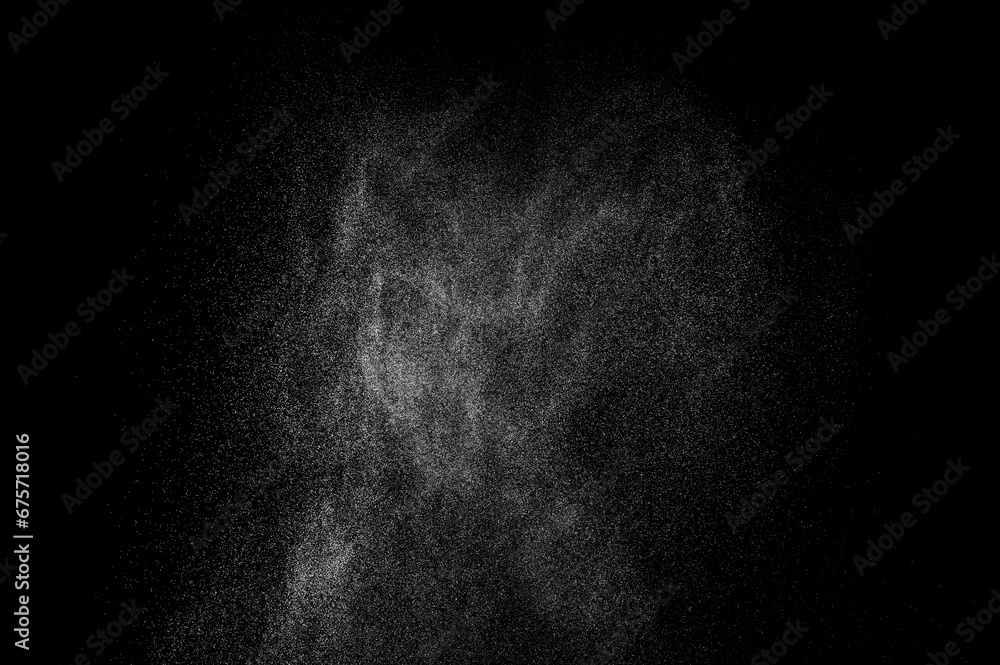 Abstract splashes of water on black background. Freeze motion of white particles. Rain, snow overlay texture.
Abstract splashes of water on black background. Freeze motion of white particles. Rain, snow overlay texture.