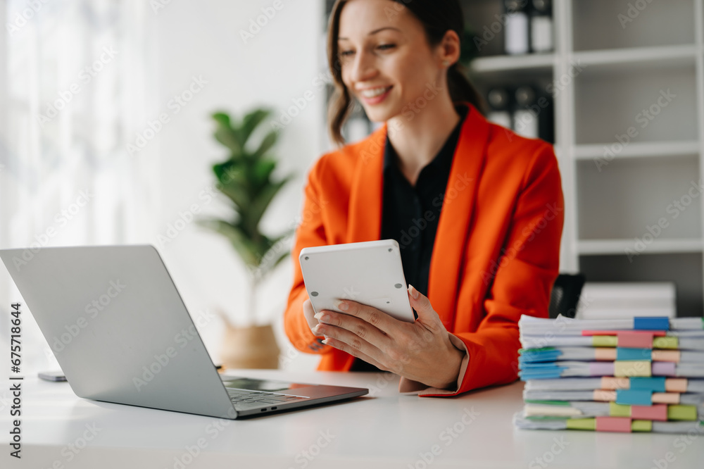 businesswoman or accountant hand typing laptop working to calculate. businesswoman or accountant hand typing laptop working to calculate.