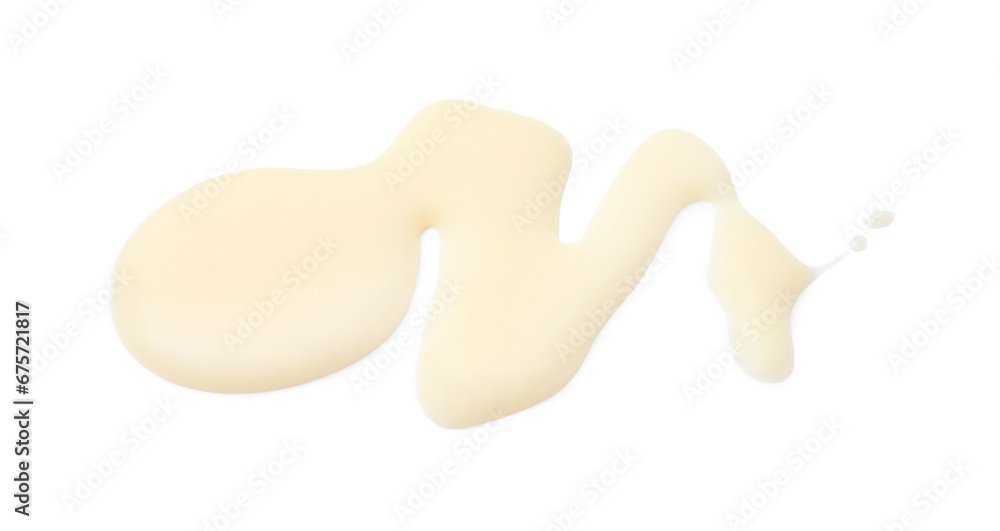 Fototapeta premium Spilled tasty condensed milk isolated on white