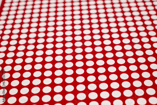 white dots on a red background