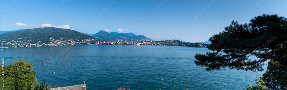 Large panoramic view of Lago Maggiore Lake from the one of  Borromean islands - Isola Bella, Northern Italy