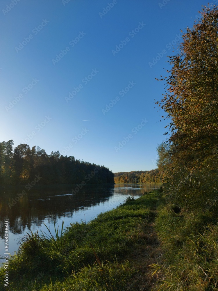 Scenic view of a river with the sun rising in the background