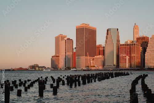 City skyline of the Financial District in New York at sunrise (ID: 675813412)