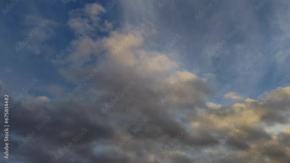 Sky landscape of golden clouds that leave and then return Sky landscape of golden clouds that leave and then return