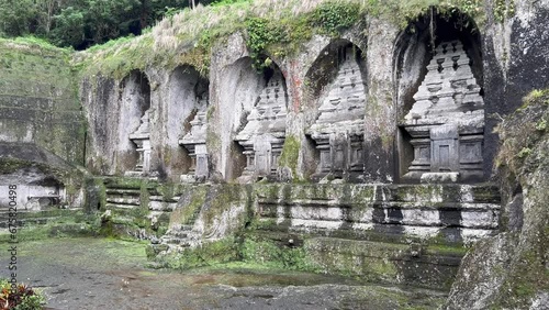 Legacy of Kings: Discovering the Candi Shrines in Gunung Kawi Holy Temple, Bali, Indonesia. Captivating 4K Scenes of Anak Wungsu's Memorial; Ideal for Cultural Explorations and Virtual Tours. photo