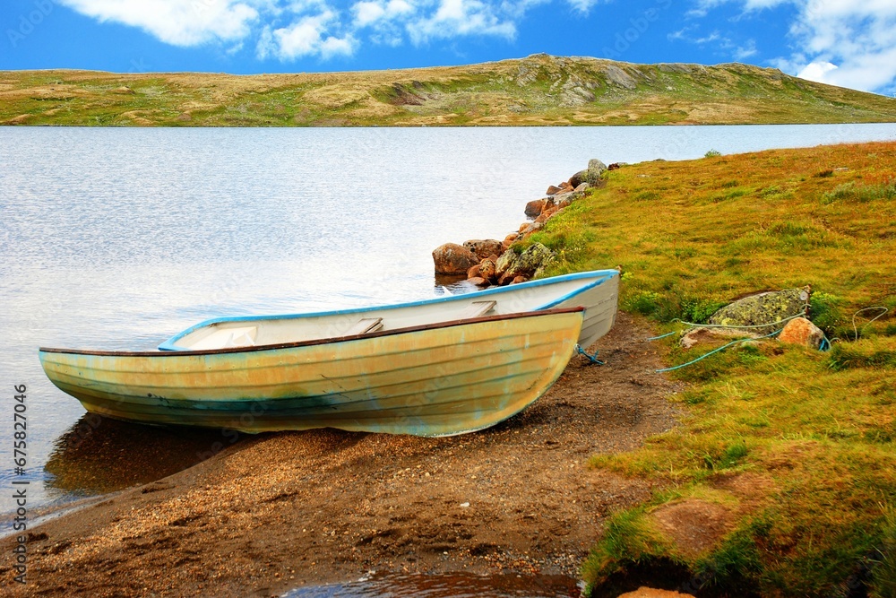 View of Hardanger (Hardangervidda) Plateau with green valley. Hardanger is mountain plateau in central southern Norway.
