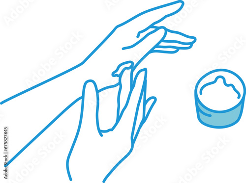 手にクリームを塗る女性の手元