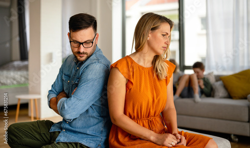 Unhappy couple having argument at home. Family, problem, quarell people concept. photo