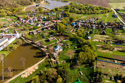 Rural development near an Orthodox monastery, aerial view. Borovsk, Russia