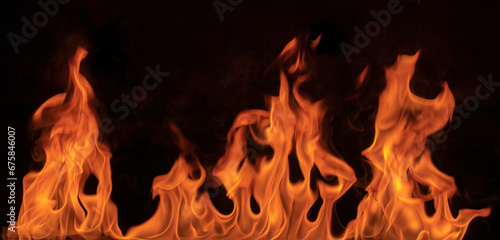 Fire flames on black background.fire flame on dark background.Beautiful yellow, orange blaze fire flame texture style.