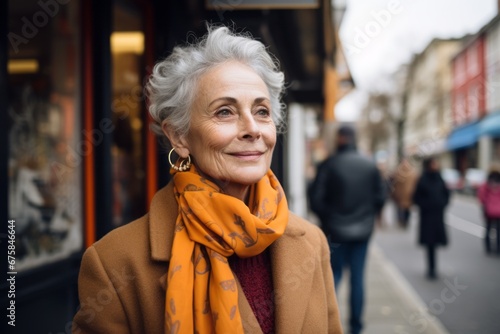 Portrait of a beautiful senior woman on the street in Paris, France
