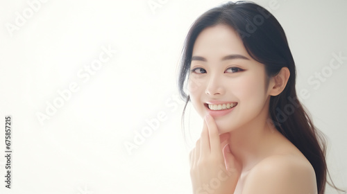 Asian Chinese woman smiling. Smooth healthy face skin. Skincare commercial portrait. Asian woman touch face well lit room. Generation AI