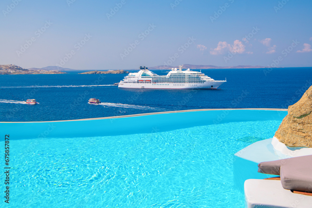 Fototapeta premium Pool view with cruise at Mykonos Island, Greece