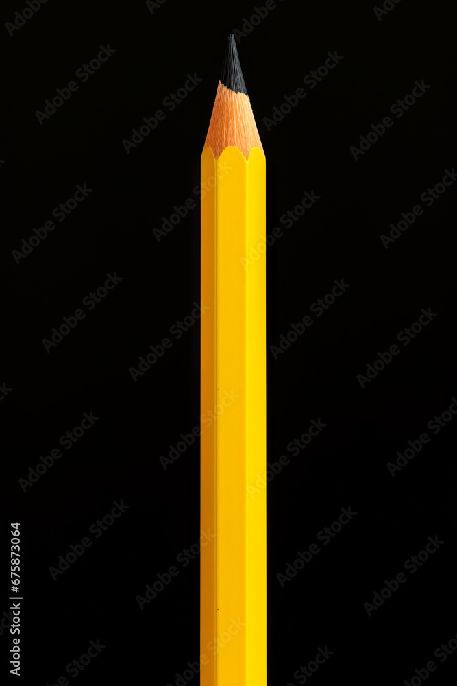 Pencil is laying on yellow surface with shadow. Pencil is laying on yellow surface with shadow.