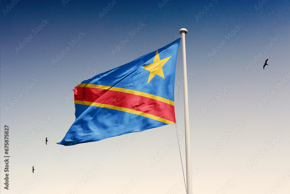 Democratic republic flag fluttering in the wind on sky. Democratic republic flag fluttering in the wind on sky.