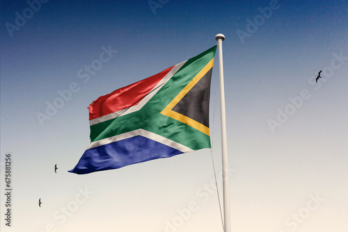 South Africa flag fluttering in the wind on sky.