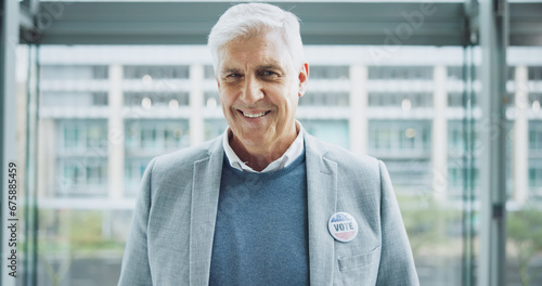 Senior man, vote sticker and portrait for election, positive and candidate for america, government and politics. Democracy, voter choice and support for party, registration and badge for voting photo