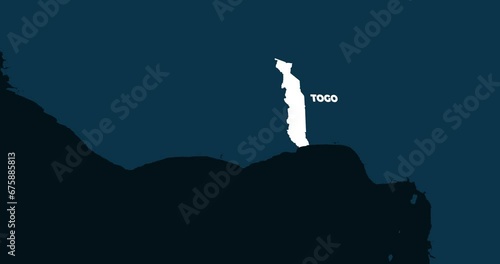 World Map Zoom In To Togo. Animation in 4K Video. White Togo Territory On Dark Blue World Map