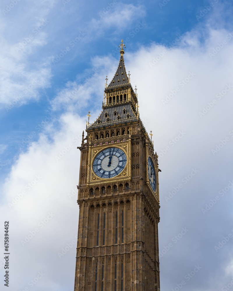 Big Ben Clock Tower against a cloudy sky in London, England