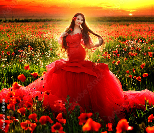 fantasy goddess woman queen in red dress. Happy princess girl in a hat collects a bouquet of poppies