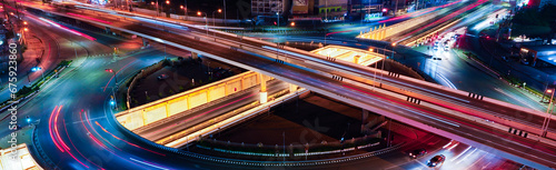 Expressway top view  Road traffic an important infrastructure  Drone aerial view fly in circle  traffic transportation  Public transport or commuter city life concept of economic and energ  transport.