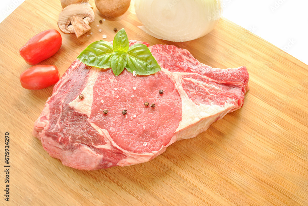 Raw Porterhouse Steak with Fresh Vegetables and Basil Raw Porterhouse Steak with Fresh Vegetables and Basil