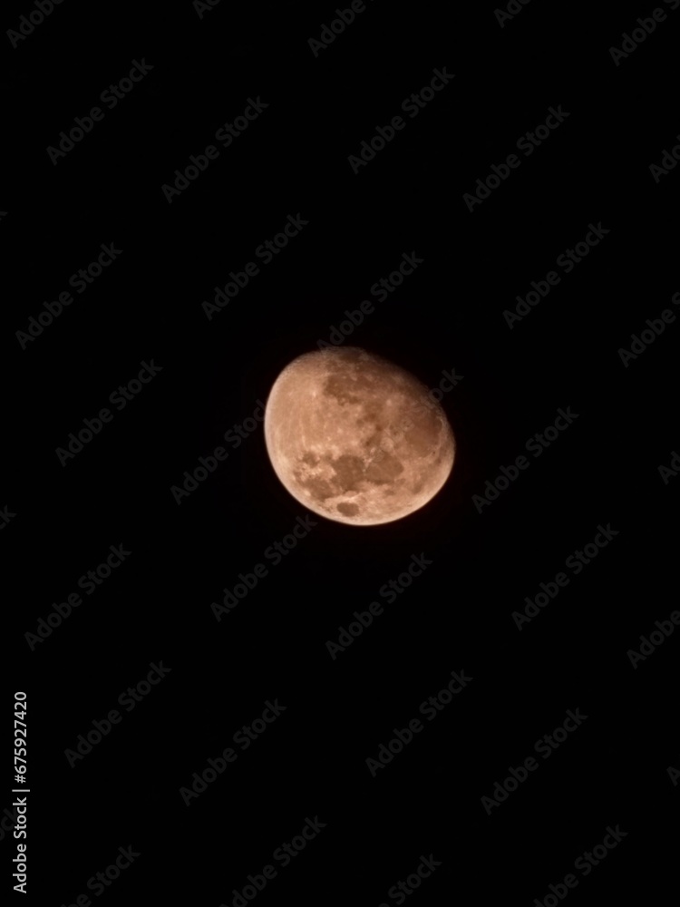the beauty of a lunar eclipse in a dark night the beauty of a lunar eclipse in a dark night