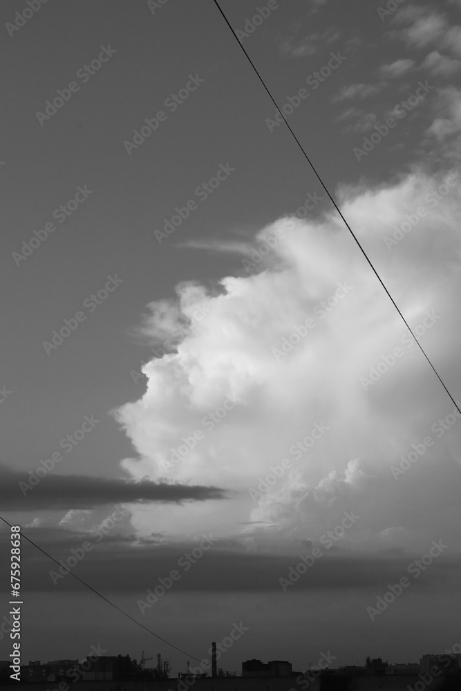 Black and white landscape. Mesmerizing contrasting clouds.