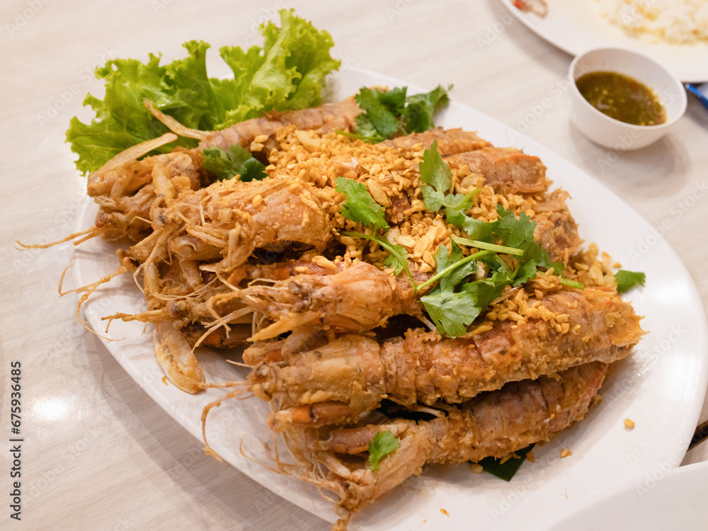 Deep fried crayfish with topping garlic
